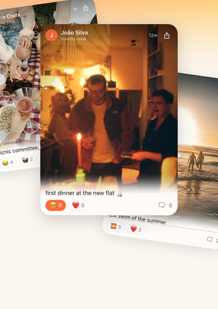Three posts in a group's feed: friends round a candle at home, a picnic and a beach at sunset, with reactions underneath.